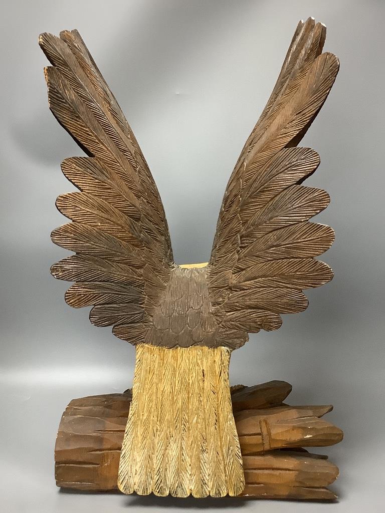 A carved wood eagle, height 61cm